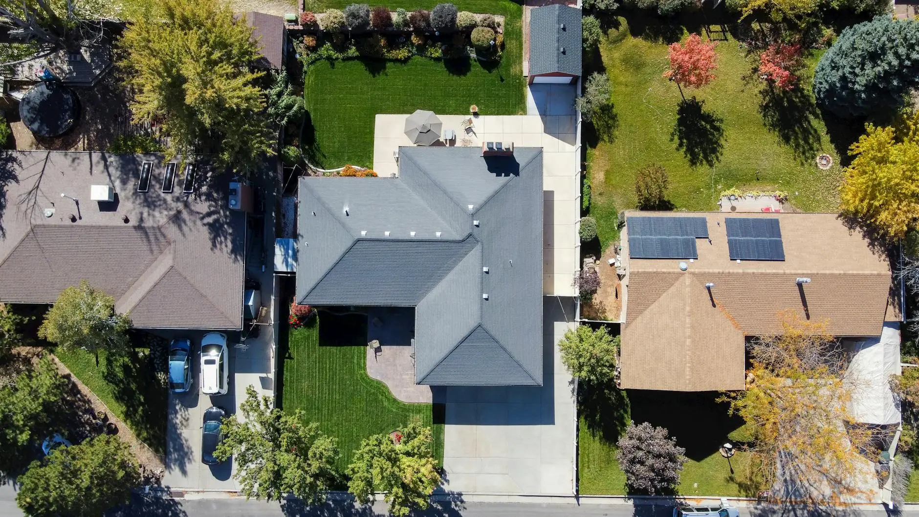 A close-up of high-quality architectural shingles installed on a West Jordan home, showing clean lines and proper ventilation.